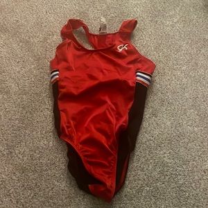 GK red and black leo with red white and blue stripes on back